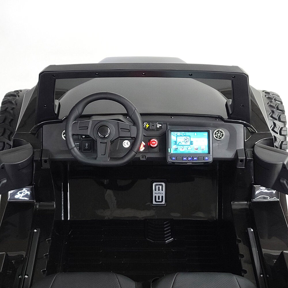 Interior dashboard and steering wheel of a black, 2-seater Clash Buggy ATV equipped with a digital display".