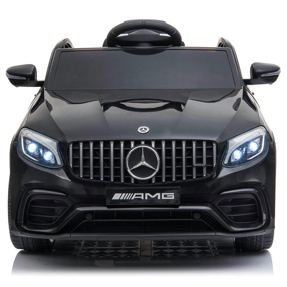 Black Mercedes GLC 63S AMG kids ride on car, coupe 12 volt electric toy, front view on a white background.