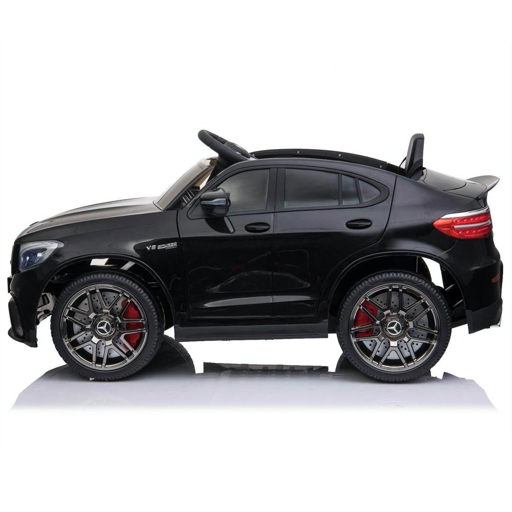 Black 12 Volt miniature model of officially licensed Mercedes GLC 63S AMG kids ride-on car coupe against a white background.