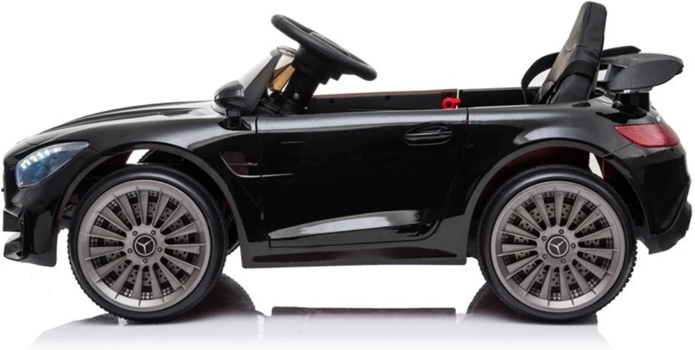 Two-seater black Mercedes AMG GTR electric ride-on toy car with parent remote, isolated on white background