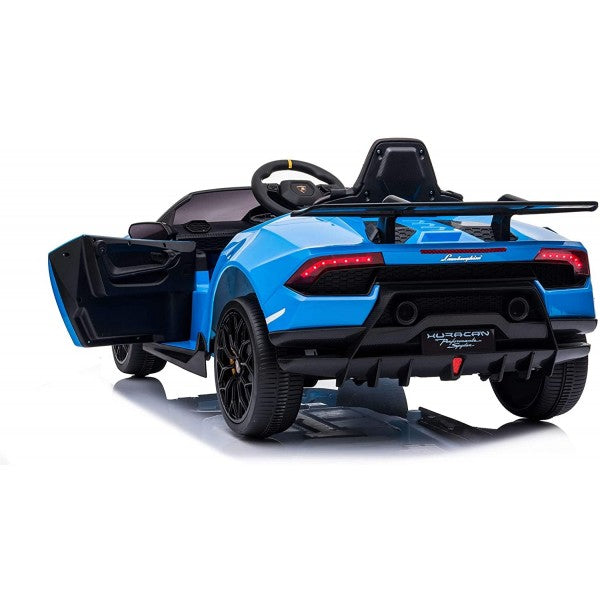 Blue Lamborghini Huracan Performante children's ride-on car with an open door, resembling a modern sports vehicle.