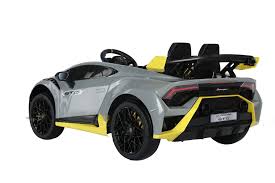 Grey Lamborghini Huracan STO 12V Drift electric ride-on car for kids featuring yellow accents and a rear spoiler