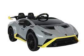 Children's Lamborghini Huracan STO 12V Drift toy replica with parental remote control, electric ride-on