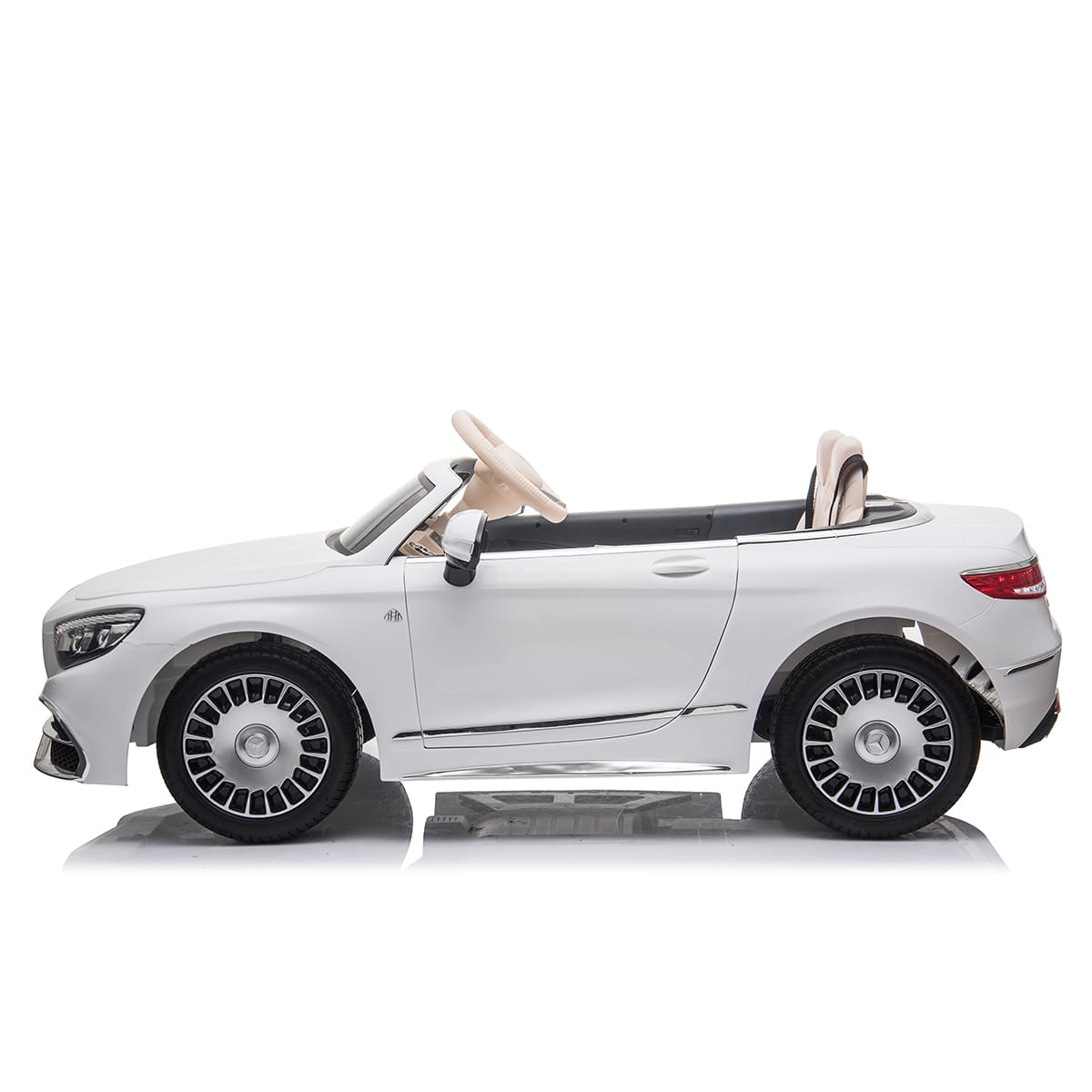 Silver Mercedes-Benz Maybach S650 convertible electric ride-on toy car for kids, side view, against a white background.