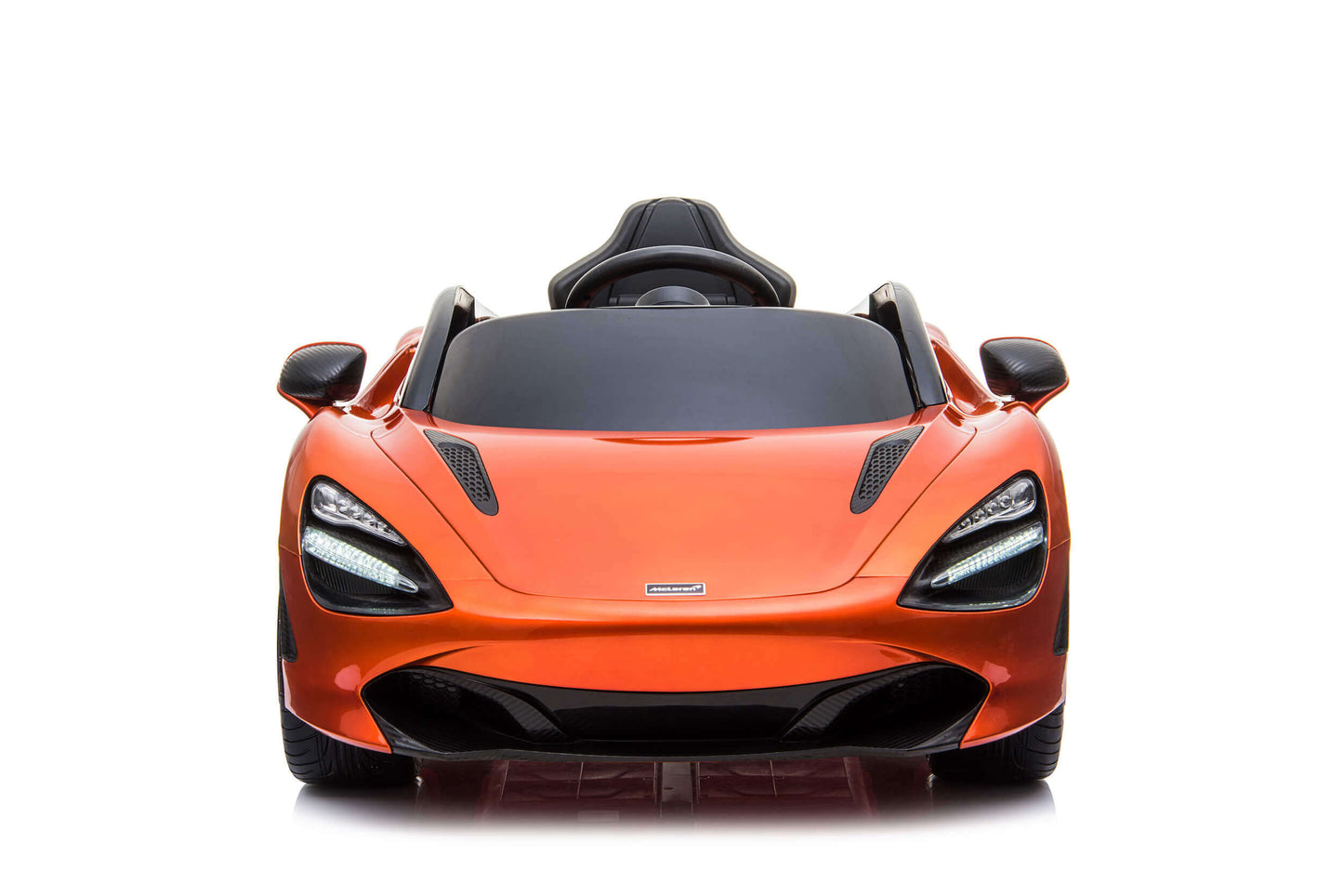 Front view of a red, battery-operated McLaren electric ride-on for children on a white background.