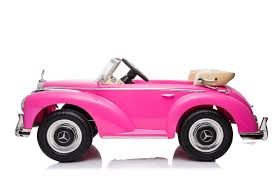 Pink Mercedes-Benz 300S electric ride-on car for kids isolated on white background.