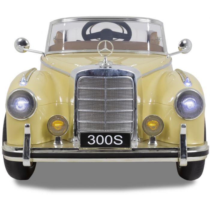 Front view of beige Mercedes Benz 300S kids electric ride-on car in cream color, officially licensed Mercedes replica.