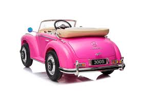 12V battery-operated Pink Mercedes Benz 300S children's electric ride-on car displayed on white background.