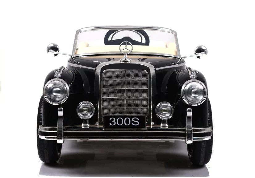 Black Mercedes Benz 300S toy car with electric ride on feature, showcased on a white background.