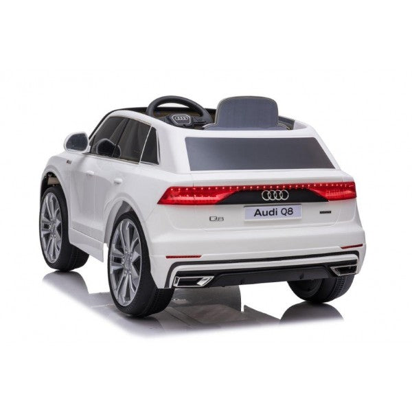 "Audi Q8 SUV Electric Ride-on 12 Volt car for kids with parental remote control on white background"