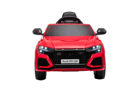 Red Audi RS Q8 12 Volt electric ride-on SUV toy car for kids isolated on white background.