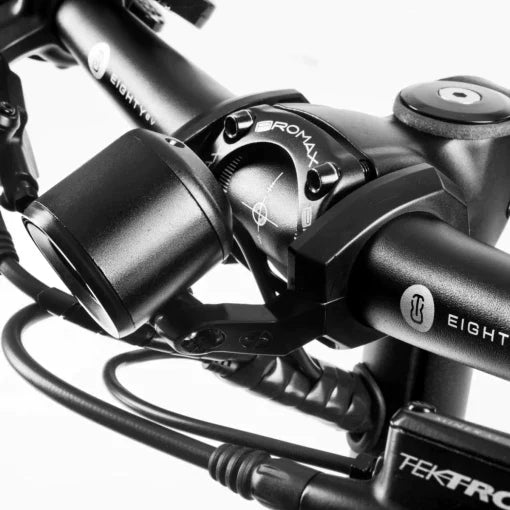 Close-up view of black and white 8TEV Electric Scooter B12 Classic handlebar assembly with Tektro hydraulic brake components