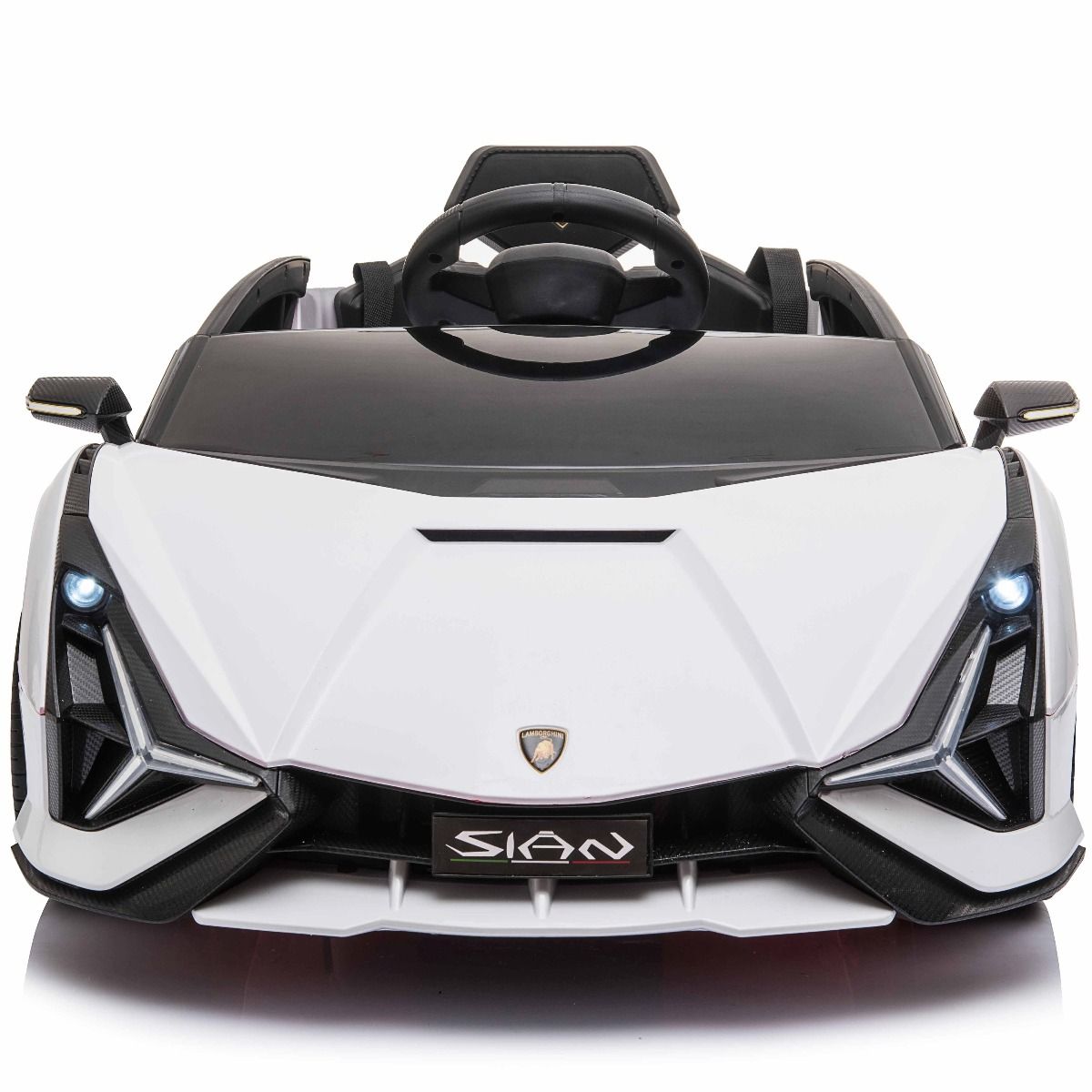 "White and black 12V Lamborghini Sian child's car with MP4 screen and parental control."
