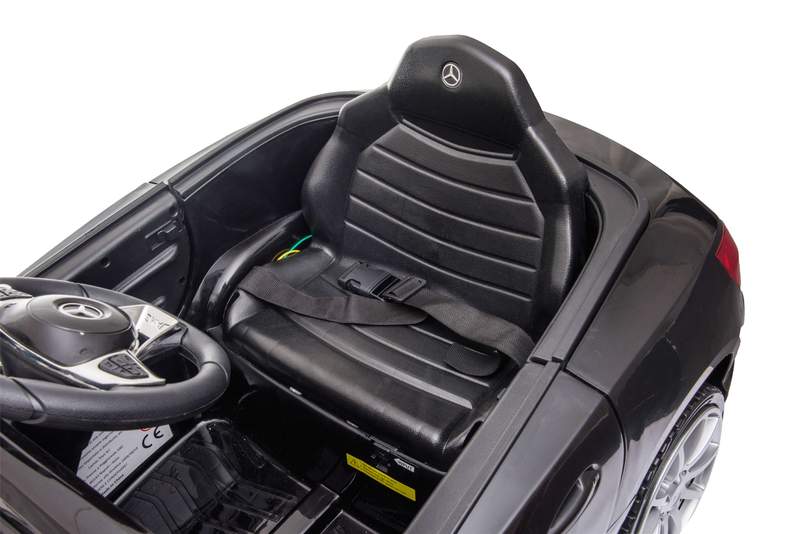 Child car seat in black Mercedes SL63, kids' electric ride on car