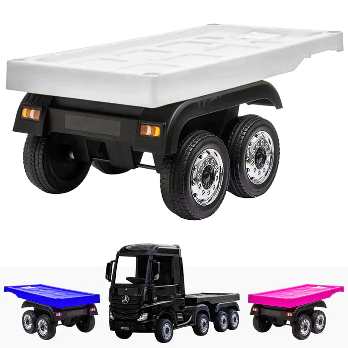 Top view of white Tesla Semi model, with blue and pink toy truck trailers and white Mercedes Actros electric ride-on with Eva rubber wheels.