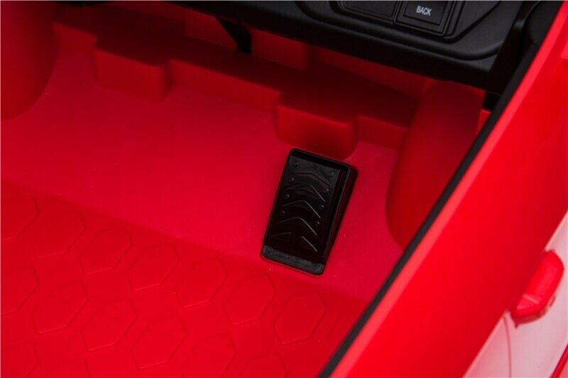 "Red Lamborghini Urus electric ride on SUV for kids with 12 Volt, featuring a red floor mat."