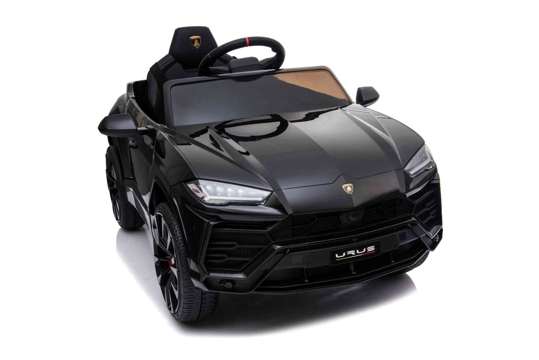 Black Lamborghini Urus children's electric SUV 12 Volt toy car on white background.