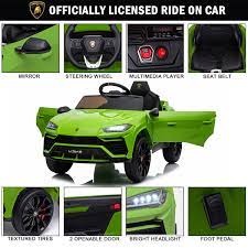 Green Lamborghini electric SUV ride-on toy with features such as mirror, steering wheel, multimedia player, seat belt, textured tires, opening doors and bright headlight.