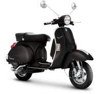 Black 12V Vespa electric ride-on scooter for kids on a white background